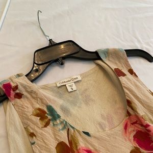 Multi colored floral dress with ruffle on bottom